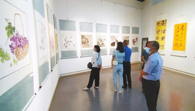 “喜迎二十大 中原出新彩”摄影书画作品展在河南省美术馆开幕