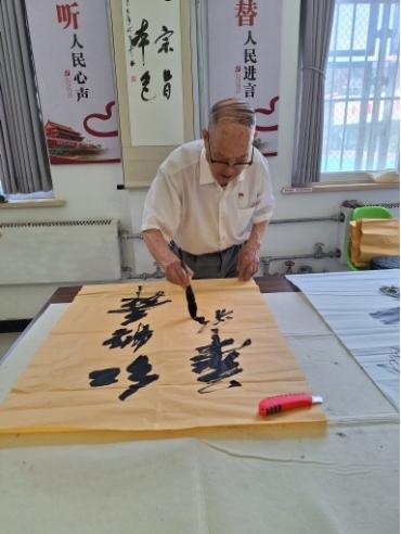 许昌老记者走基层庆七一